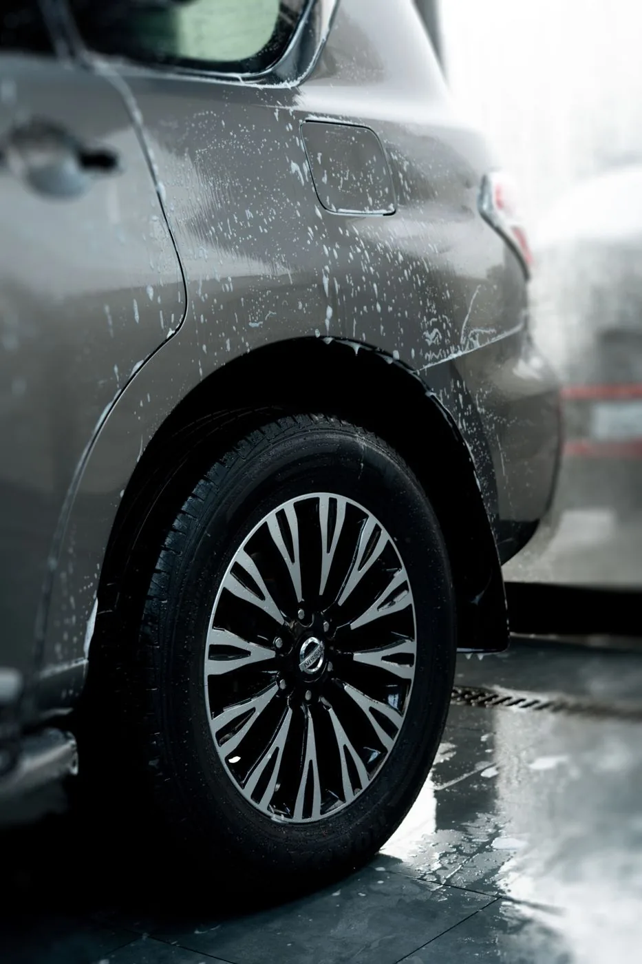 Foam wash on an SUV rear quarter panel