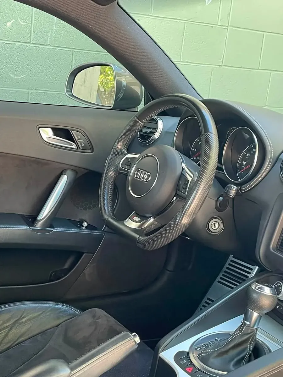 Detailed Audi TT steering wheel and dashboard